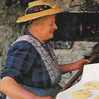 cottura de pane in un vecchio forno